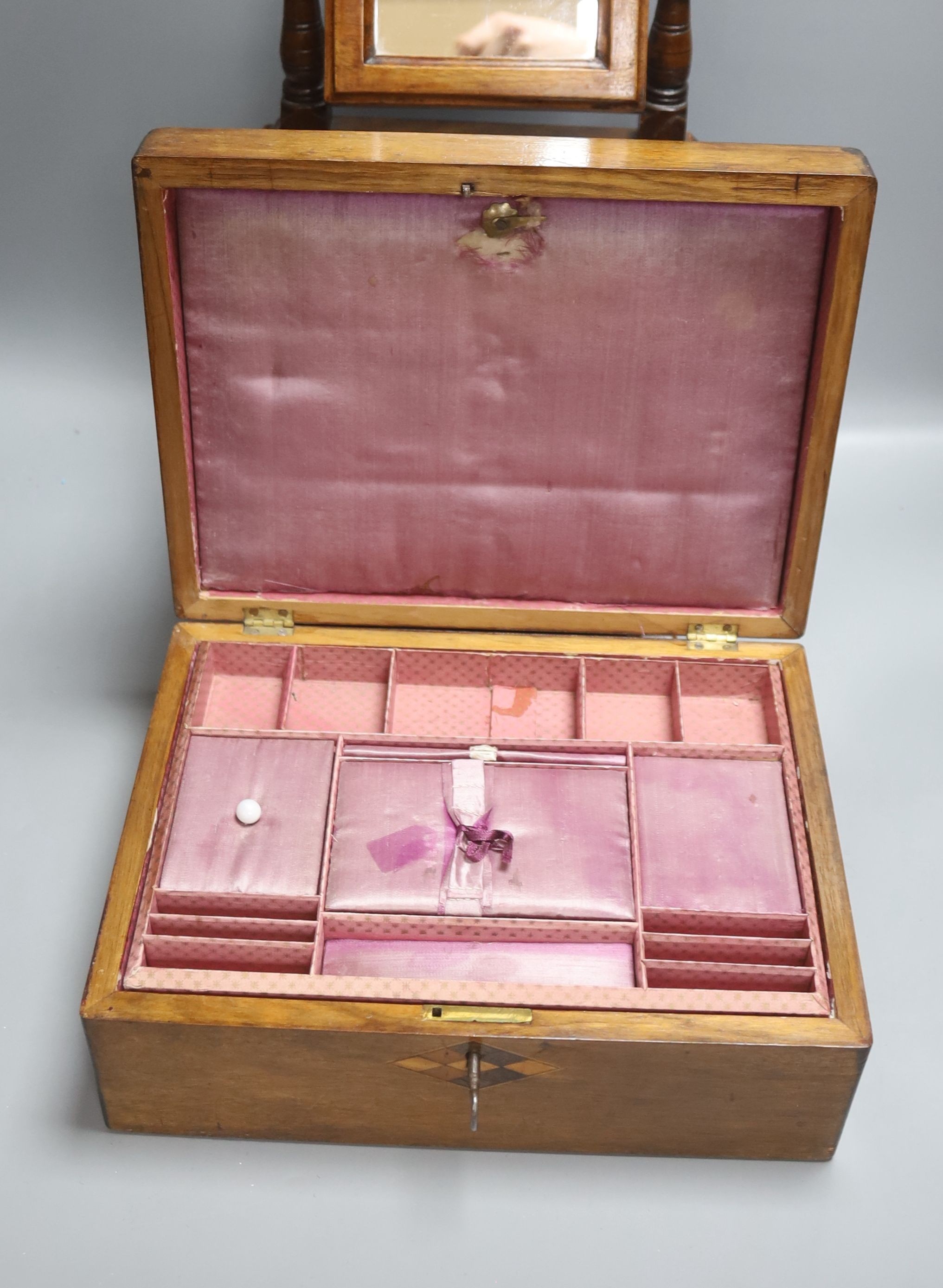 A Victorian walnut workbox and a miniature mahogany chest, height 42cm